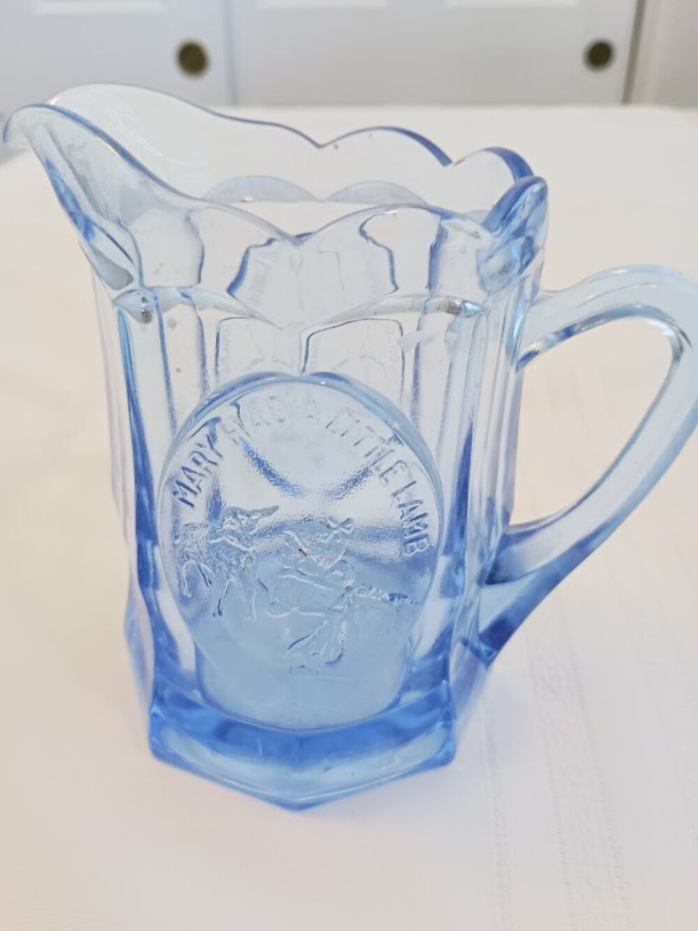 Vintage Tiara Glass Blue Pitcher with Nursery Rhymes on Two Sides